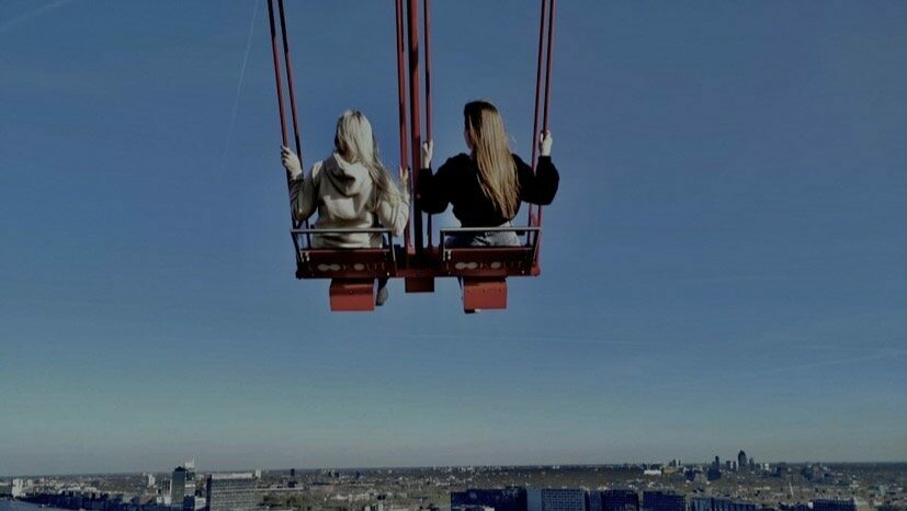 Megan and her friend at the ADAM Tower swing in Amsterdam